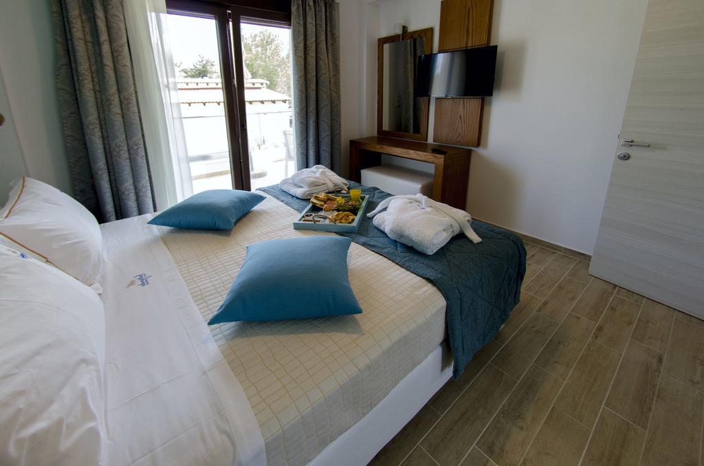 Hatzoudis Luxury Suites Chrysi Ammoudia Exterior photo
